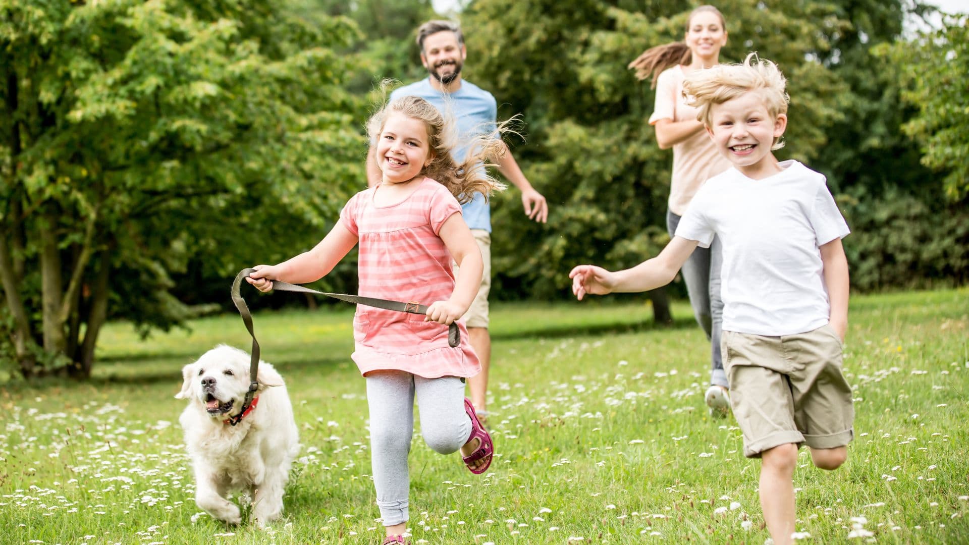 Family enjoying natural mosquito control treatment in Rhode Island